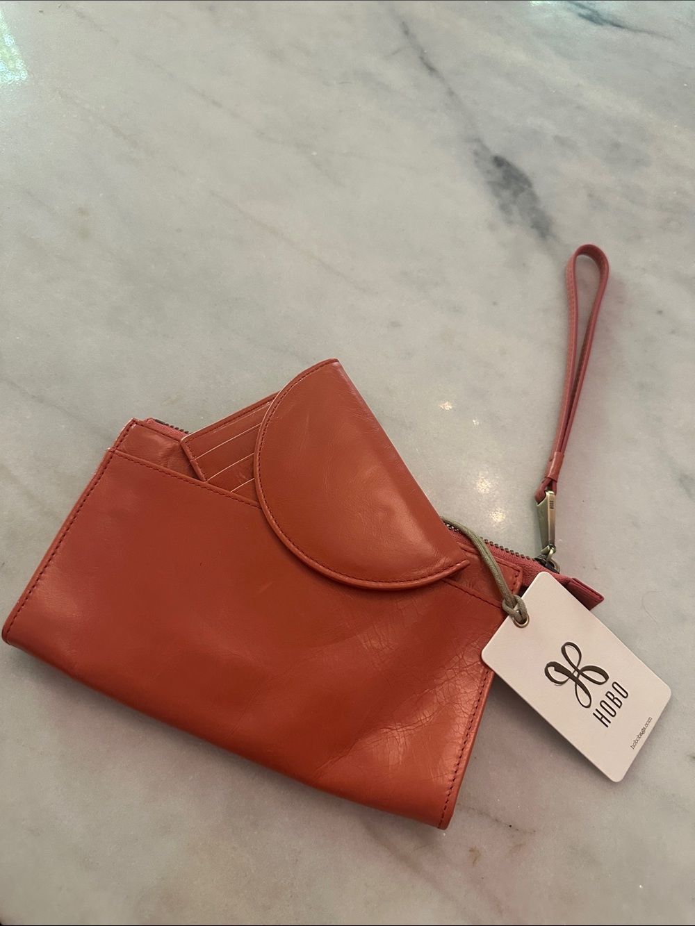 HOBO Coral Orange Leather Wristlet with Front Pocket